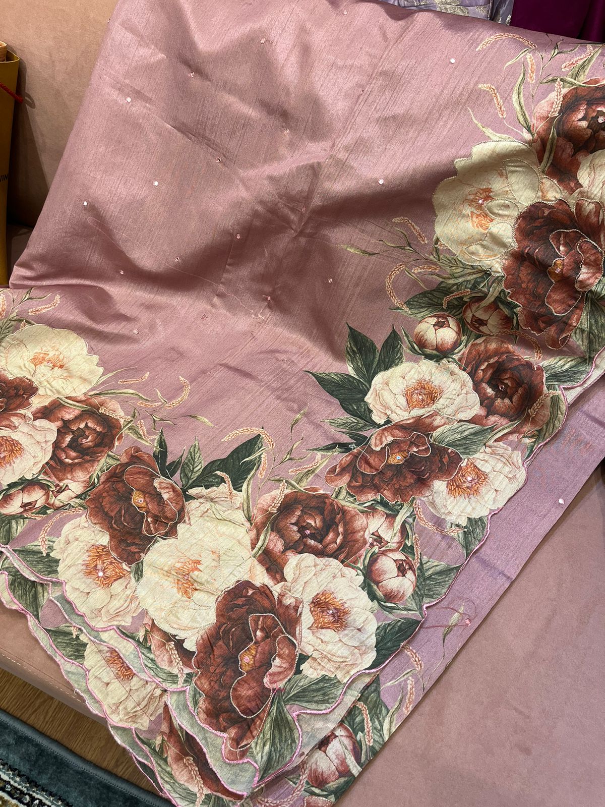 An onion pink colored semi tussar saree with big floral prints (MCSEP119)