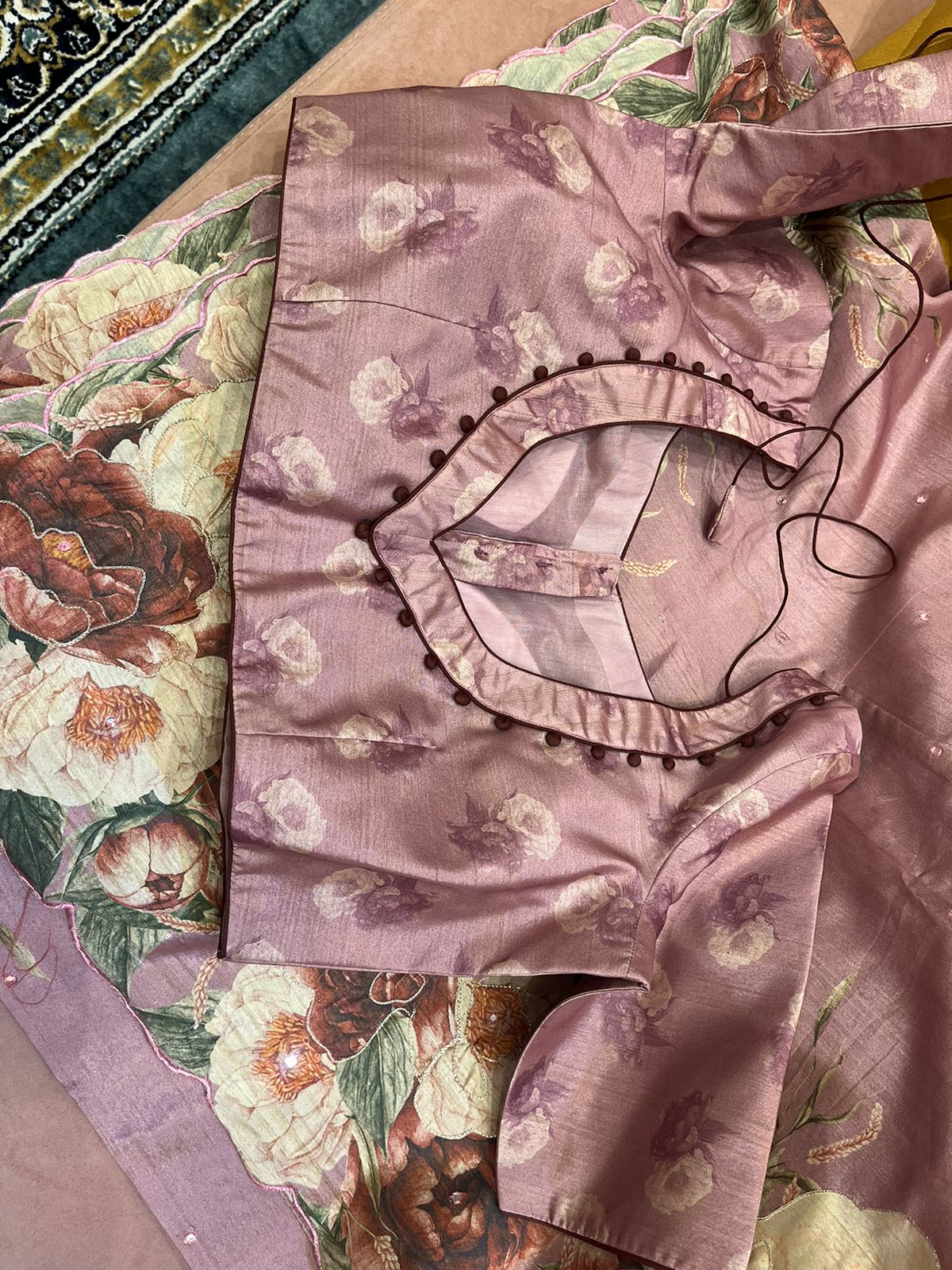 An onion pink colored semi tussar saree with big floral prints (MCSEP119)