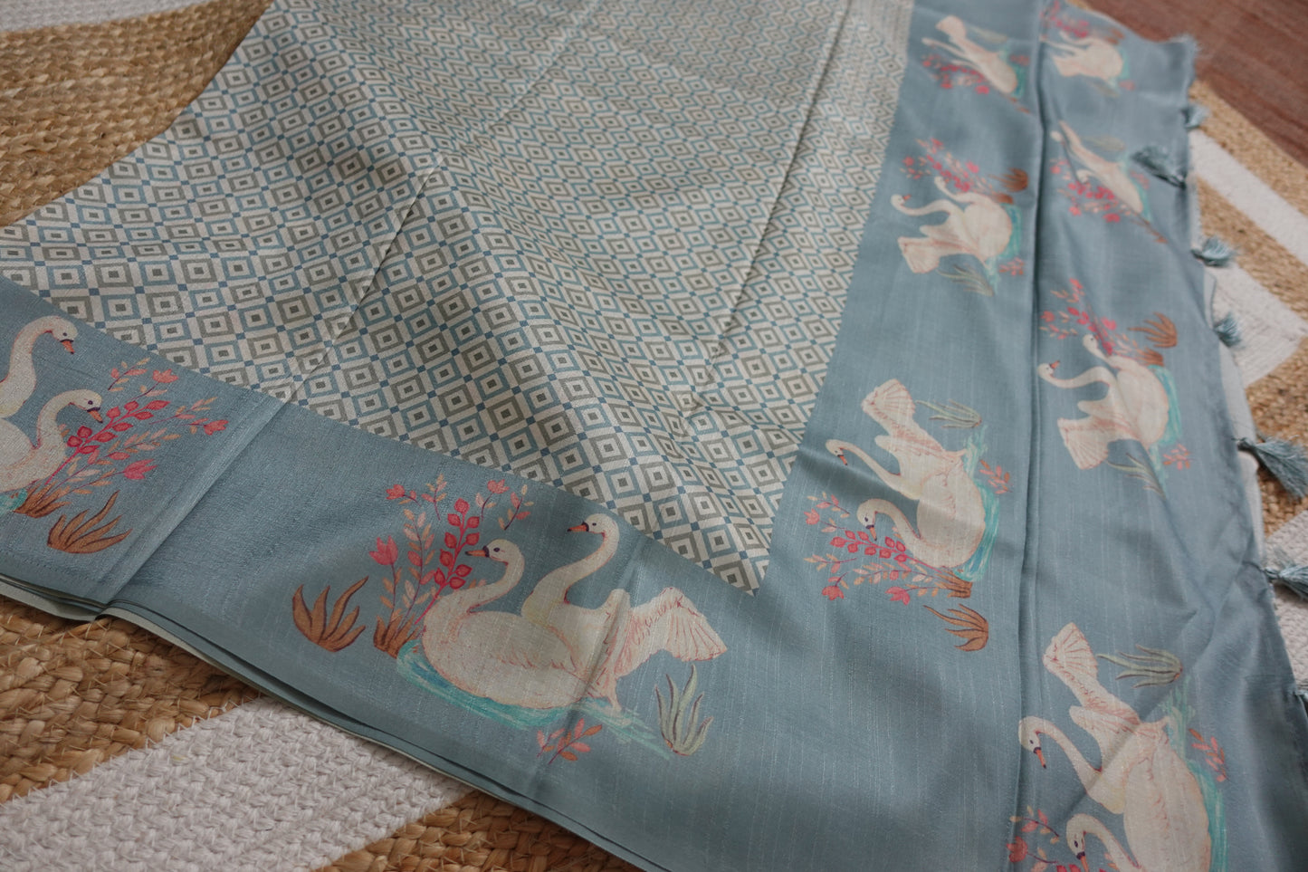 Pastel Blue Saree with Swan Borders