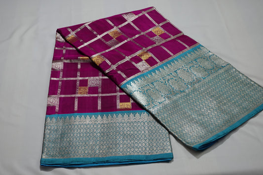 A bold purple Venkatagiri silk saree with sky blue color borders (VKG00005)