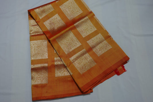 An orange colored Venkatagiri silk saree without borders (VKG00010)