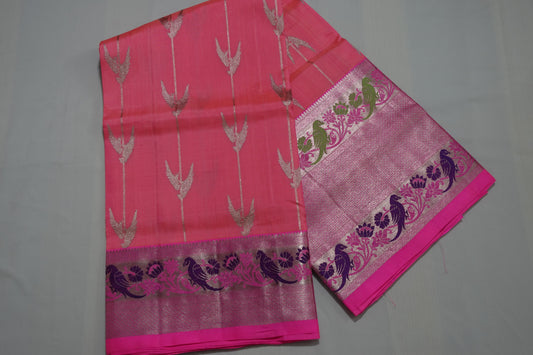 A candy pink colored Venkatagiri silk saree with pink colored bird themed borders (VKG00019)
