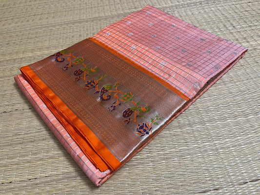 A pastel orange colored Paithani styled Venkatagiri saree (VKG00038)